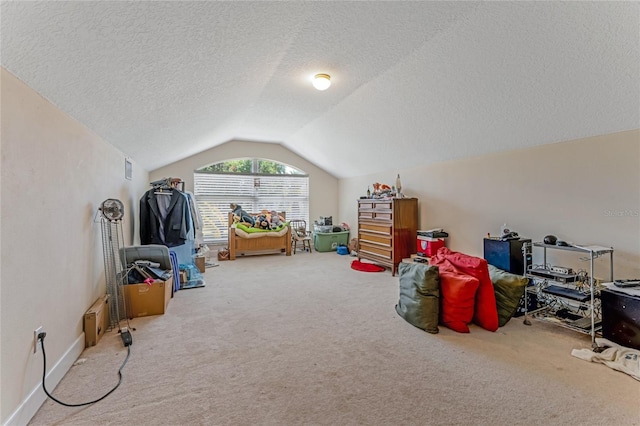 69 Coquina Ridge Way, Ormond Beach, FL 32174 - rec room featuring vaulted ceiling, carpet flooring, and a textured ceiling