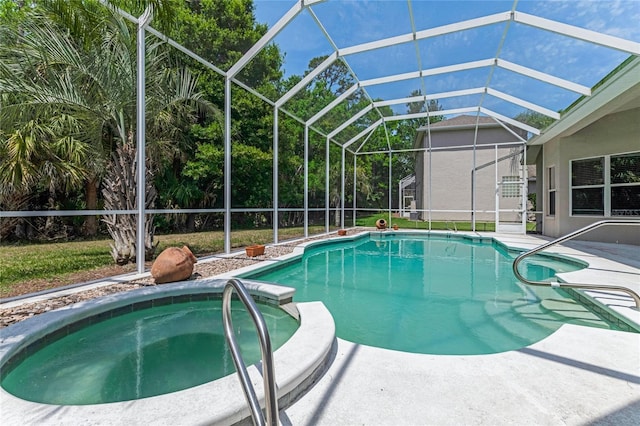 69 Coquina Ridge Way, Ormond Beach, FL 32174 - view of swimming pool with a lanai, a patio, and a pool with connected hot tub