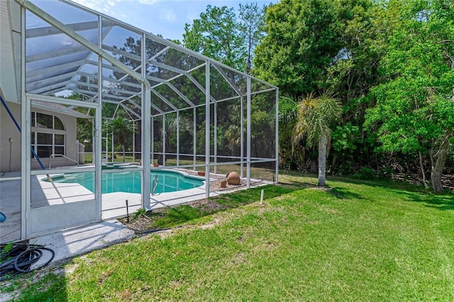 69 Coquina Ridge Way, Ormond Beach, FL 32174 - outdoor pool with a yard and a patio area