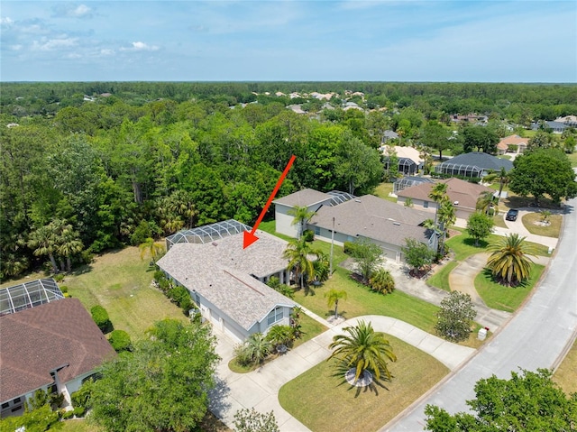 69 Coquina Ridge Way, Ormond Beach, FL 32174 - drone / aerial view with a residential view and a forest view