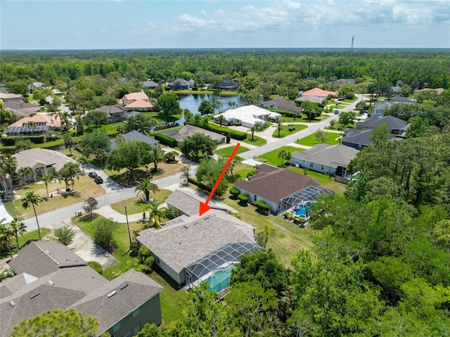 69 Coquina Ridge Way, Ormond Beach, FL 32174 - bird's eye view featuring a wooded view and a residential view