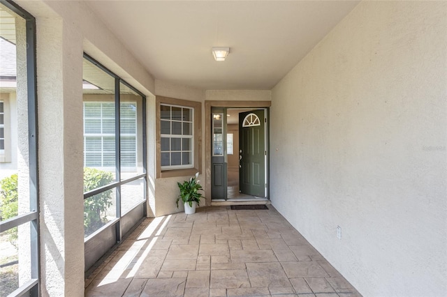 28 Weller Ln, Palm Coast, FL 32164 - property entrance with stucco siding