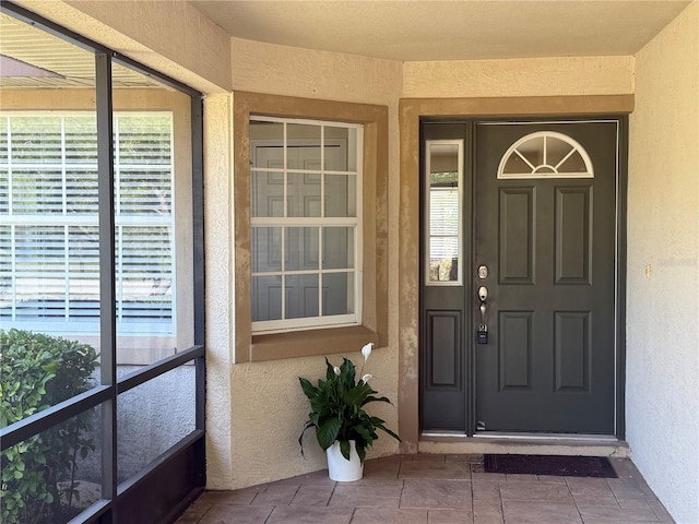 28 Weller Ln, Palm Coast, FL 32164 - view of exterior entry with stucco siding
