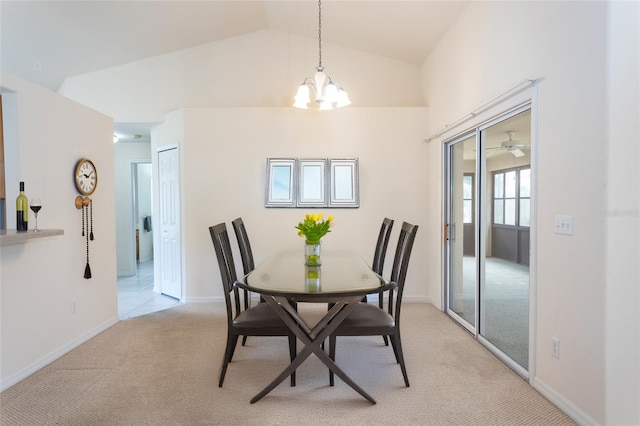 28 Weller Ln, Palm Coast, FL 32164 - dining space featuring an inviting chandelier, baseboards, high vaulted ceiling, and light colored carpet