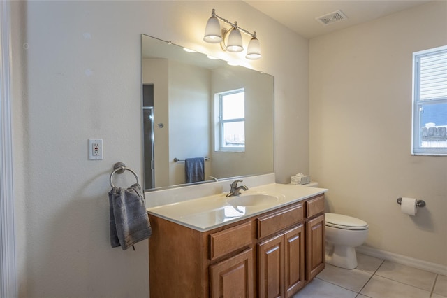 28 Weller Ln, Palm Coast, FL 32164 - bathroom featuring vanity, toilet, tile patterned floors, baseboards, and visible vents