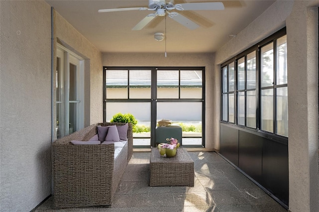 28 Weller Ln, Palm Coast, FL 32164 - sunroom featuring a textured wall and ceiling fan
