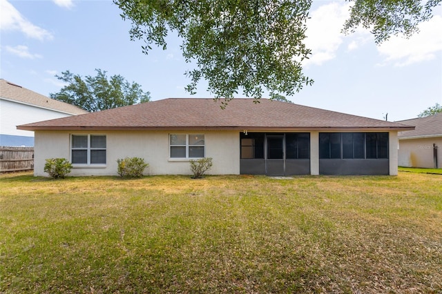 28 Weller Ln, Palm Coast, FL 32164 - rear view of property with a lawn, a sunroom, and stucco siding