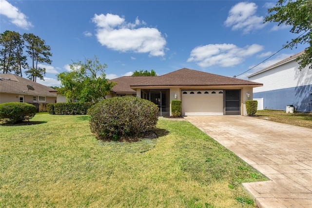28 Weller Ln, Palm Coast, FL 32164 - ranch-style house featuring an attached garage, stucco siding, driveway, and a front yard