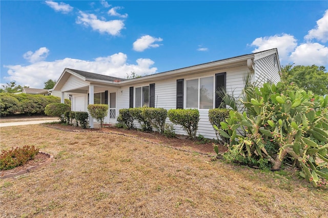 8720 SW 108th Ln, Ocala, FL 34481 - view of front of property with an attached garage and a front lawn