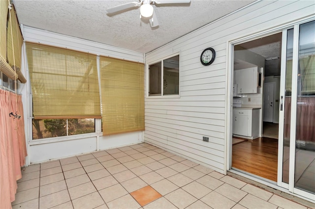 8720 SW 108th Ln, Ocala, FL 34481 - unfurnished sunroom with a ceiling fan