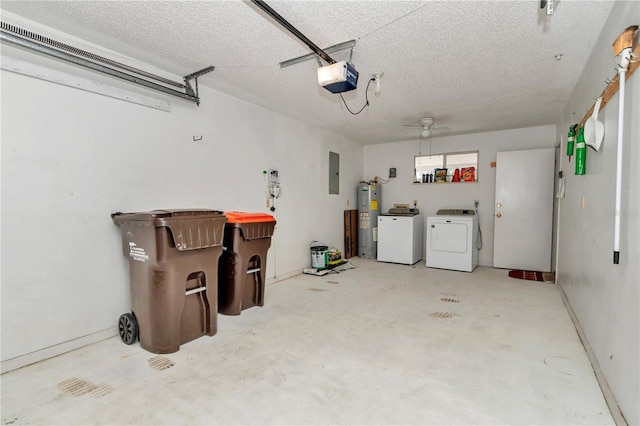 8720 SW 108th Ln, Ocala, FL 34481 - garage featuring washing machine and dryer, baseboards, a garage door opener, electric panel, and electric water heater