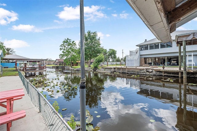 view of dock with a water view