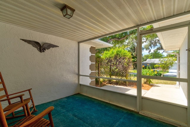 unfurnished sunroom with a healthy amount of sunlight