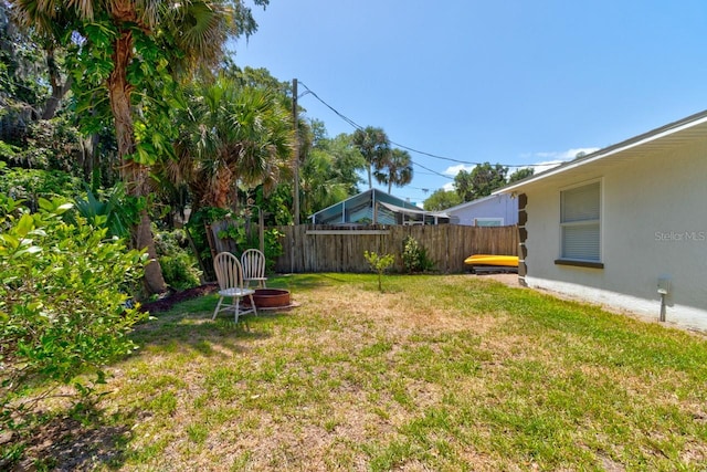 view of yard with fence