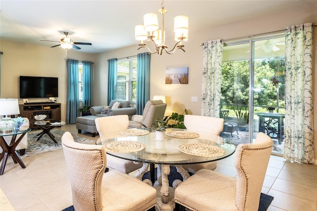 35 Park Place Cir, Palm Coast, FL 32164 - dining space featuring light tile patterned floors and ceiling fan with notable chandelier