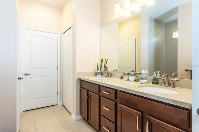 35 Park Place Cir, Palm Coast, FL 32164 - full bathroom featuring double vanity, a sink, and tile patterned flooring