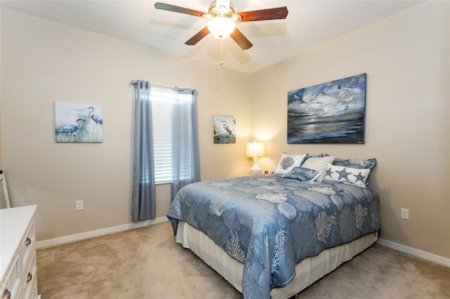 35 Park Place Cir, Palm Coast, FL 32164 - bedroom with baseboards, light colored carpet, and ceiling fan
