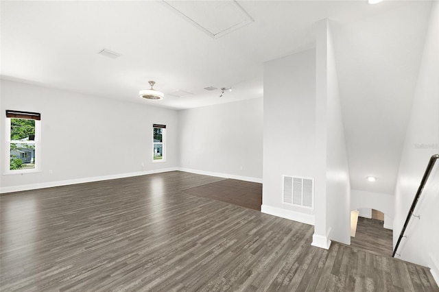 23 Essington Ln, Palm Coast, FL 32164 - empty room featuring baseboards, visible vents, dark wood finished floors, and attic access