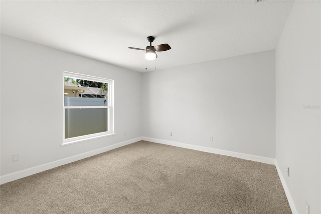 23 Essington Ln, Palm Coast, FL 32164 - carpeted empty room with baseboards and a ceiling fan