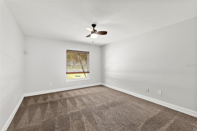 23 Essington Ln, Palm Coast, FL 32164 - spare room with dark colored carpet, a textured ceiling, baseboards, and ceiling fan