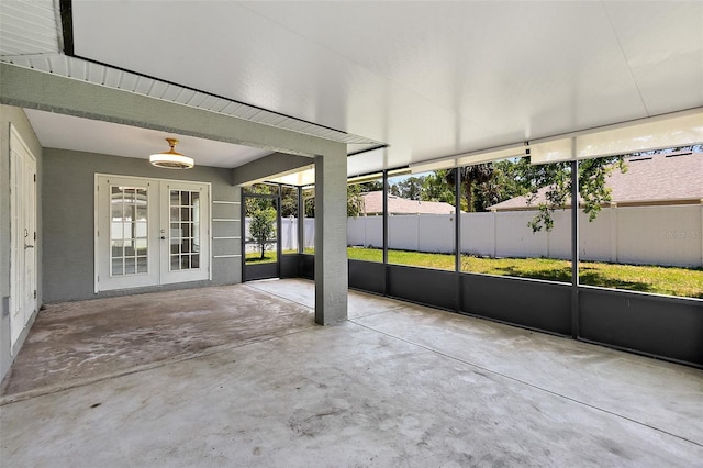 23 Essington Ln, Palm Coast, FL 32164 - unfurnished sunroom featuring french doors