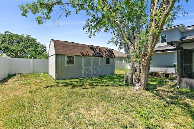 23 Essington Ln, Palm Coast, FL 32164 - view of yard with a storage shed, an outbuilding, and a fenced backyard