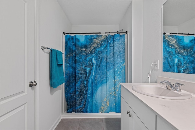 full bath featuring tile patterned floors, curtained shower, and vanity