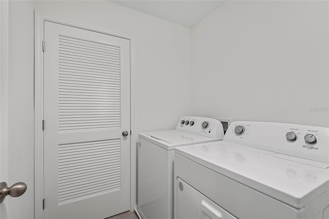 laundry area featuring laundry area and washing machine and dryer