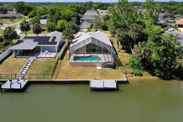 bird's eye view with a water view and a residential view