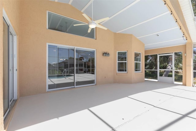 view of patio featuring a ceiling fan