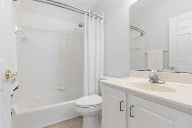 bathroom with vanity, shower / bathtub combination with curtain, toilet, and tile patterned flooring
