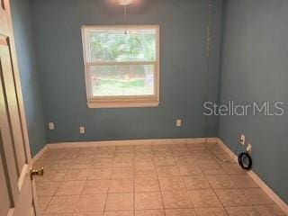 39 Bird Of Paradise Dr, Palm Coast, FL 32137 - unfurnished room featuring baseboards