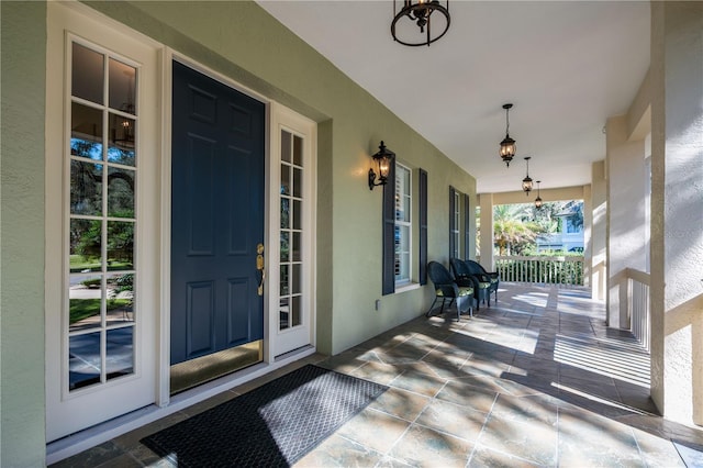 view of patio featuring a porch