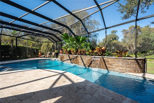 outdoor pool with a patio and a lanai