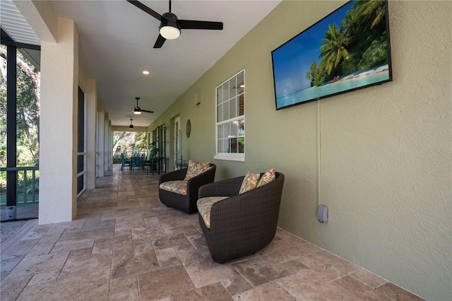 view of patio with ceiling fan