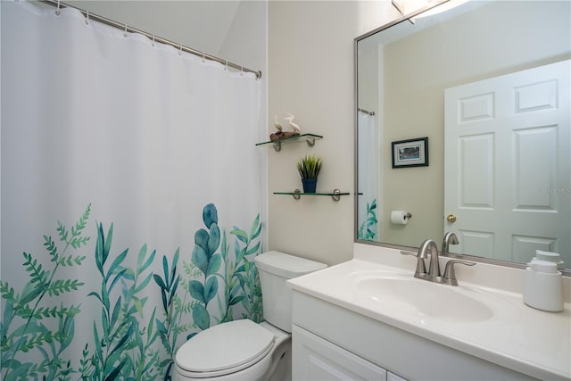 full bath with vanity and toilet