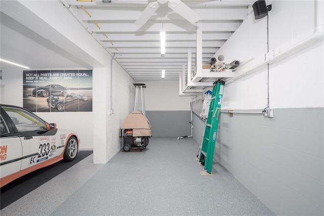 garage featuring a ceiling fan