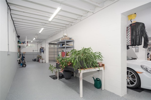 garage featuring concrete block wall