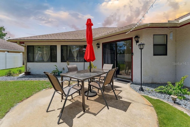 25 Westlawn Pl, Palm Coast, FL 32164 - view of patio featuring fence and outdoor dining area