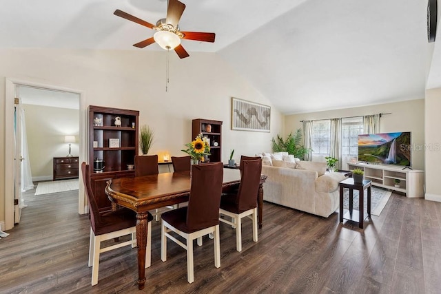 25 Westlawn Pl, Palm Coast, FL 32164 - dining area featuring baseboards, a ceiling fan, high vaulted ceiling, and dark wood-type flooring