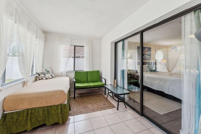25 Westlawn Pl, Palm Coast, FL 32164 - bedroom with light tile patterned flooring