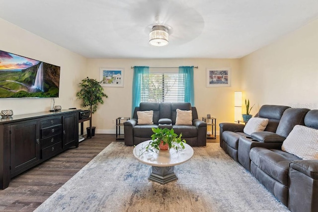 25 Westlawn Pl, Palm Coast, FL 32164 - living room featuring baseboards and dark wood-type flooring