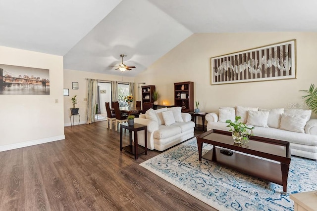 25 Westlawn Pl, Palm Coast, FL 32164 - living area featuring baseboards, ceiling fan, dark wood-style flooring, and lofted ceiling