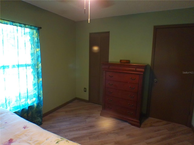 bedroom featuring light wood-type flooring