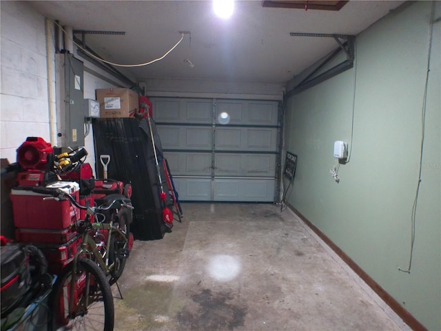 garage featuring baseboards