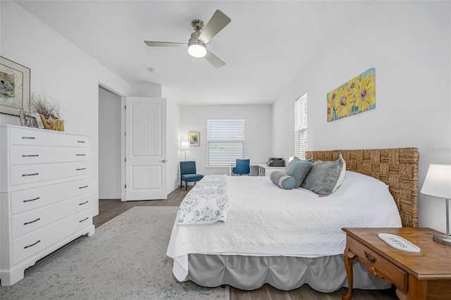 bedroom featuring a ceiling fan and wood finished floors