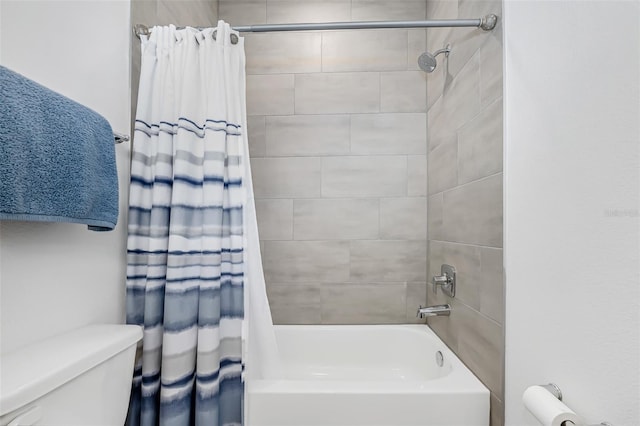 full bath featuring toilet and shower / bath combo