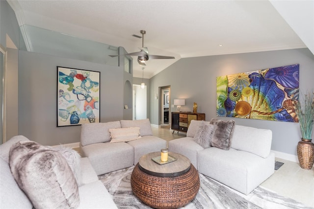 living area featuring crown molding, ceiling fan, arched walkways, baseboards, and lofted ceiling