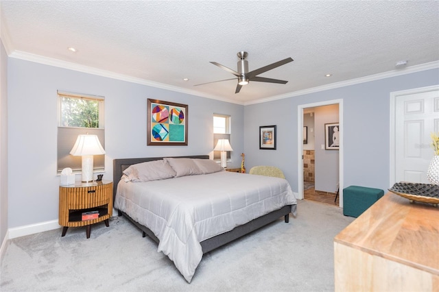 bedroom with baseboards, ornamental molding, light carpet, and multiple windows