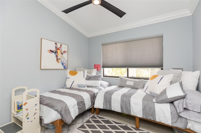 bedroom with ceiling fan, ornamental molding, and lofted ceiling